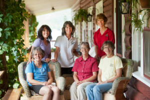 At the end of a quarter-mile dirt road are the Lodge, a breakfast café, and lakeside cabins, graced with gardens and pristine international Lake Wallace.